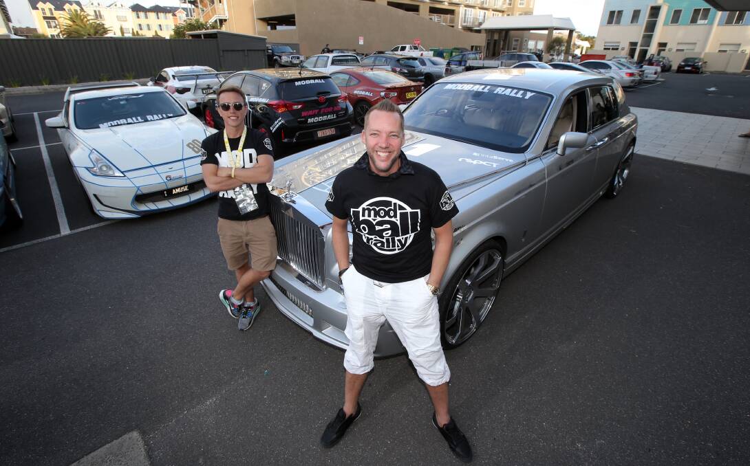 Brisbane’s Jon Eaves (right) with his 2004 Rolls-Royce Phantom and Modball Rally organiser Jon Bourgerie after the 125-car convoy arrived in Warrnambool late yesterday. 
141027DW54 Picture: DAMIAN WHITE