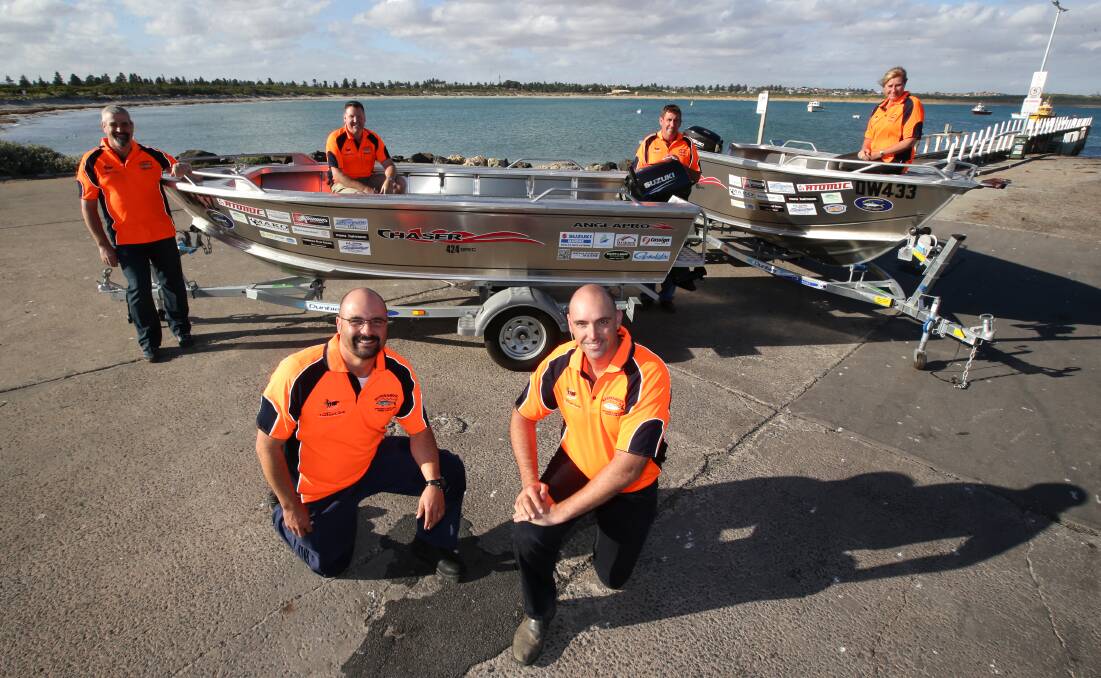Warrnambool Offshore and Light Game Fishing Club members Ben Pohlner (front left) and Lucas Wilson, Peter Goode (back left), Darren Baker, Peter Kavanagh and Helen Bartlett check out the boats up for grabs as prizes in next week’s fishing competition. 
