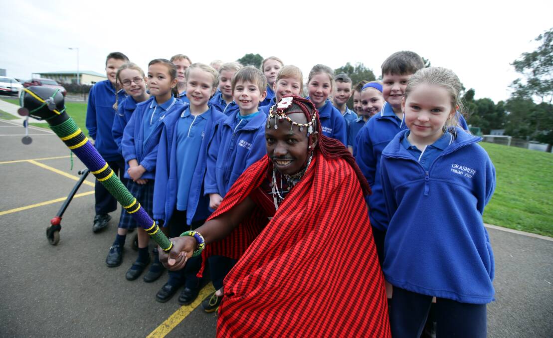 Felix Mollel shares some Maasai culture with Grassmere Primary School grade 2 and 3 pupils. 140618DW06 Picture: DAMIAN WHITE