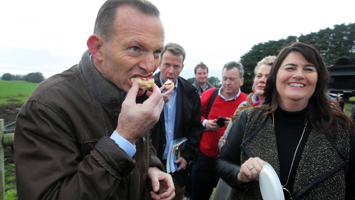Prime Minister Tony Abbott and Member for Wannon Dan Tehan enjoy country hospitality and fresh jam and cream scones at the Woolsthorpe farm of Roma Britnel (right), after the launch of the Agriculture White Paper. Picture: ROB GUNSTONE
