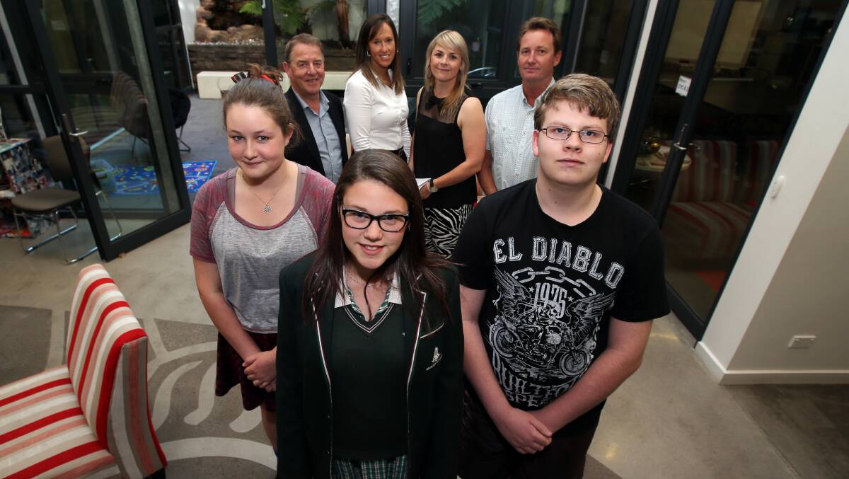 Students Bonnie McKenzie (front left), Sharna Rogers-Brigden, Jordon Jobe and Standing Tall co-ordinator Gary Parsons (rear left) and mentors Marion Simonds, Kelly Giblin and David Bridgwater have all benefited from the program.141121DW40 Picture: DAMIAN WHITE