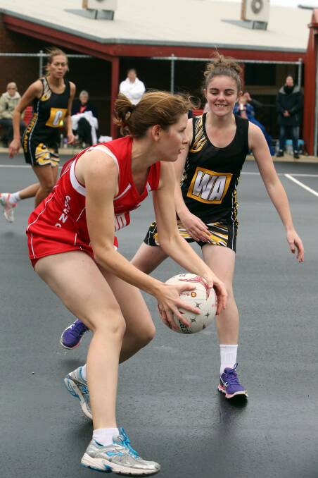 South Warrnambool’s Liz Byrne helps her side to victory against Portland. 