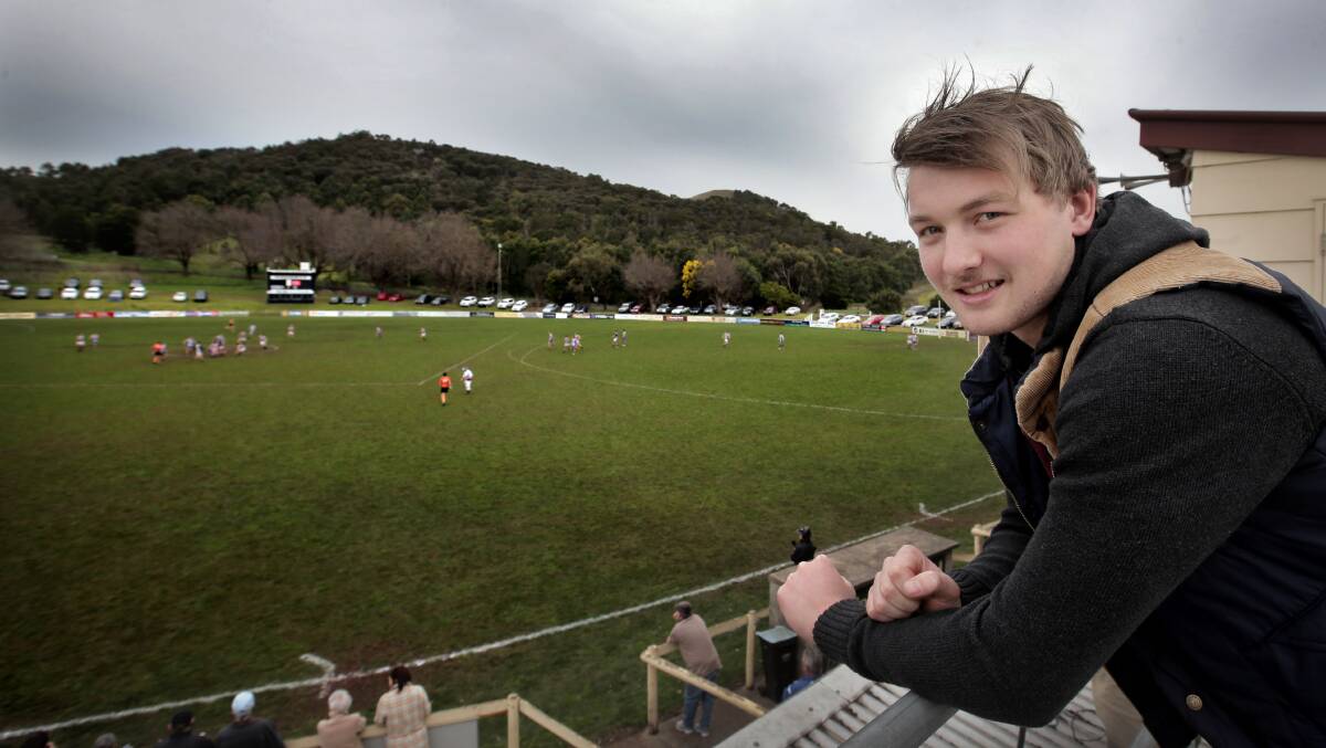 Jack Williams, 18, watches his Camperdown teammates play from the coach’s box at Leura oval last weekend. He is recovering from a golden staph infection that cost him the rest of this season — and almost his life.      
140809AM122  Picture: ANGELA MILNE