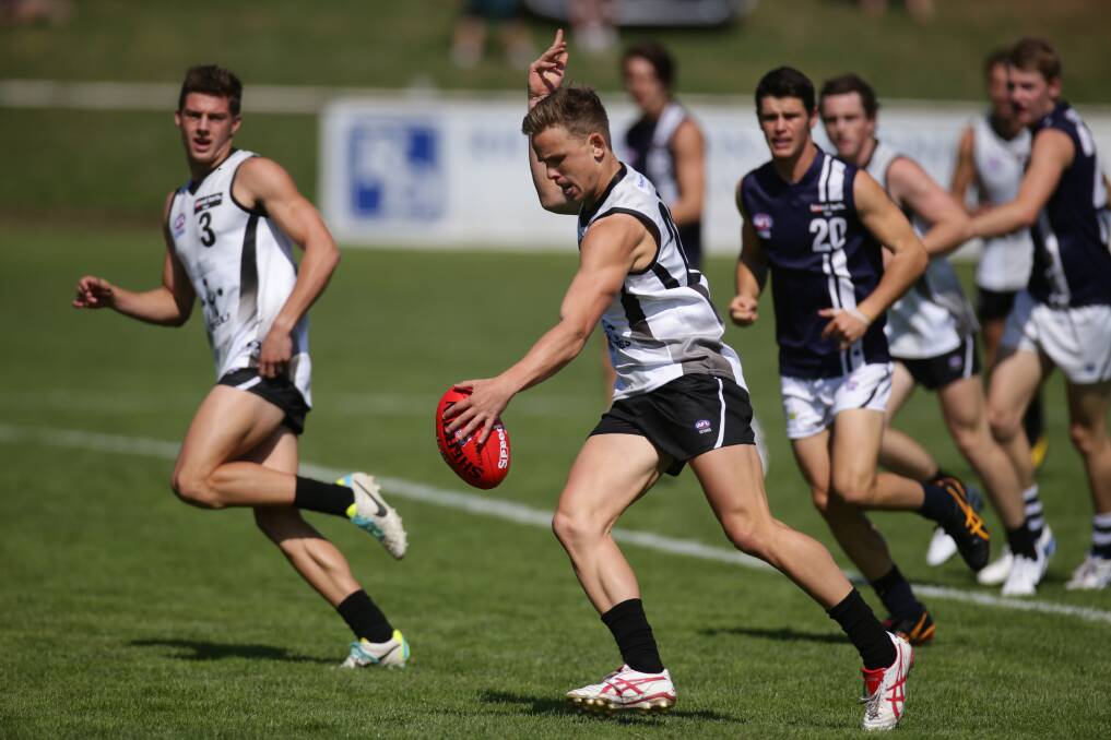 Tom Templeton in action for the Rebels against the Geelong Falcons in March. 