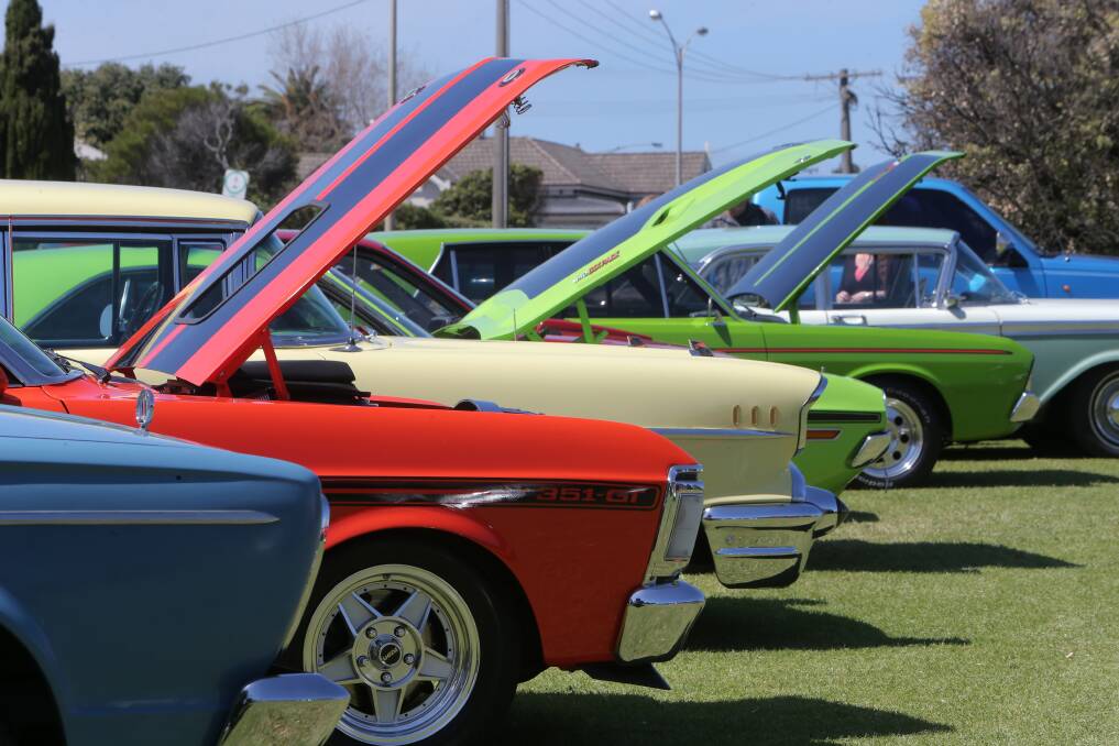 Bonnets are raised to show off immaculate engines at the Warrnambool Kruzin Classics car display on Saturday. 141011AS65