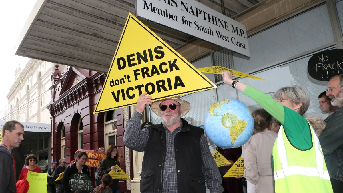 TOP LEFT: Portland’s Andrew Delony joins anti-fracking protesters who marched through Warrnambool to Premier Denis Napthine’s office.  141011AS04 Pictures: AARON SAWALL