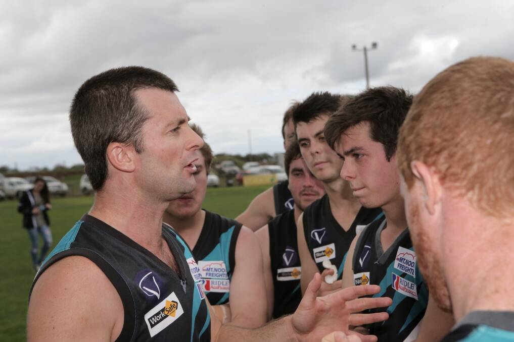 Ben Kenna spells out the plan to his players earlier this season. The veteran Kolora-Noorat playing coach has stepped aside after six years and three premierships. 140419AS16 Picture: AARON SAWALL