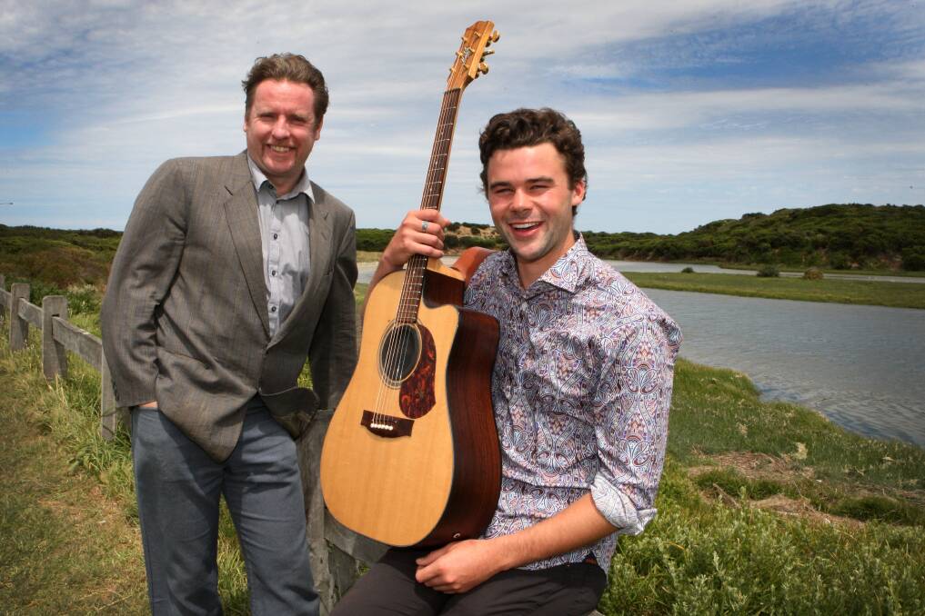 Music Victoria CEO Patrick Donovan (left) and Warrnambool musician Liam Gubbins at yesterday’s official launch of the count­down to Warrnambool’s inaugural Aus Music Festival, which will kick off on October 30 next year. 141031LP24  Picture: LEANNE PICKETT