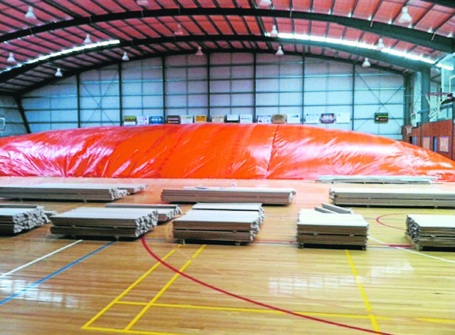 A large dome has been placed over the water-damaged floor of the Camperdown Stadium to dry it out.
Picture: Supplied