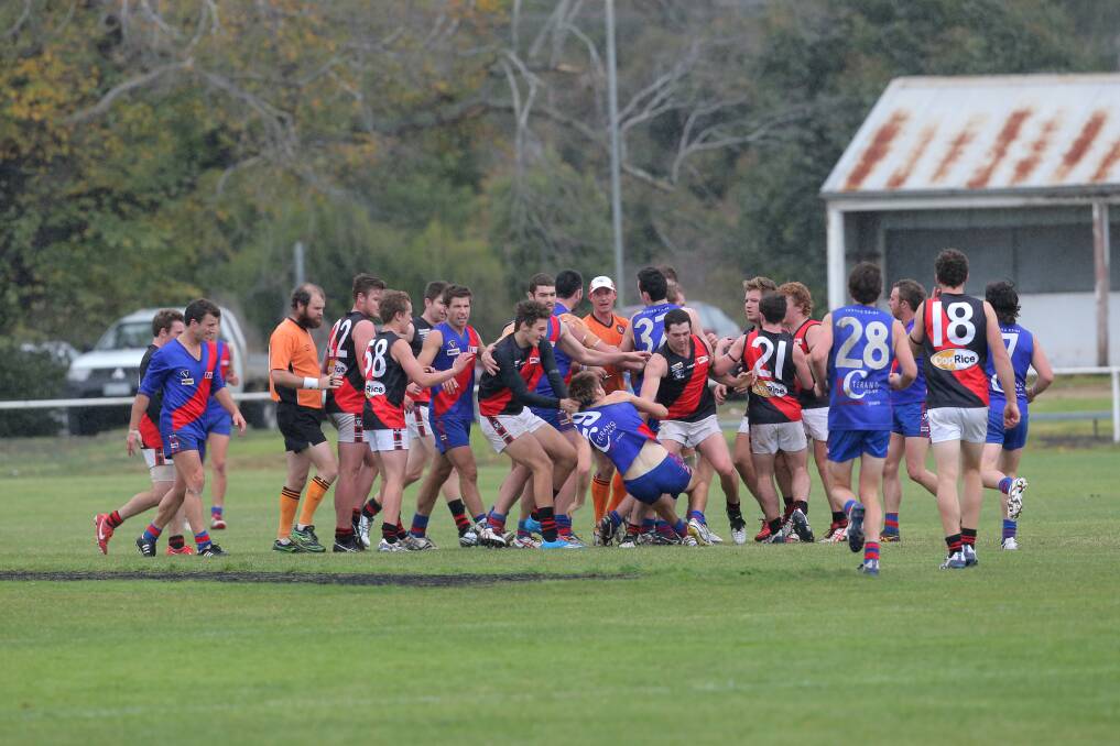 Terang Mortlake and Cobden players get more closely acquainted during their clash on Saturday in Mortlake.  140509VH37  Picture: VICKY HUGHSON