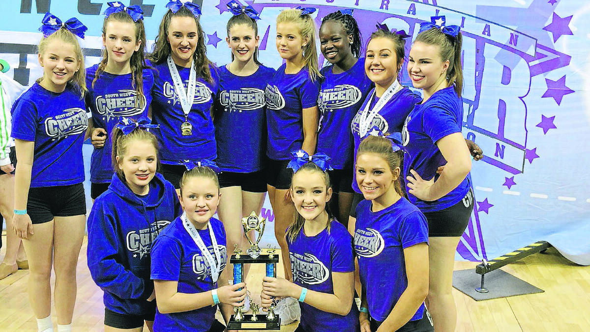 The South West Cheer and Dance Gym girls display the spoils of their first competition in Melbourne. Picture: Supplied