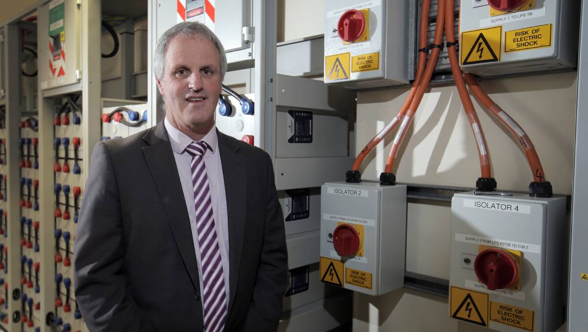 Telstra’s Bill Mundy with the new isolation switches that have been installed at the Warrnambool exchange.