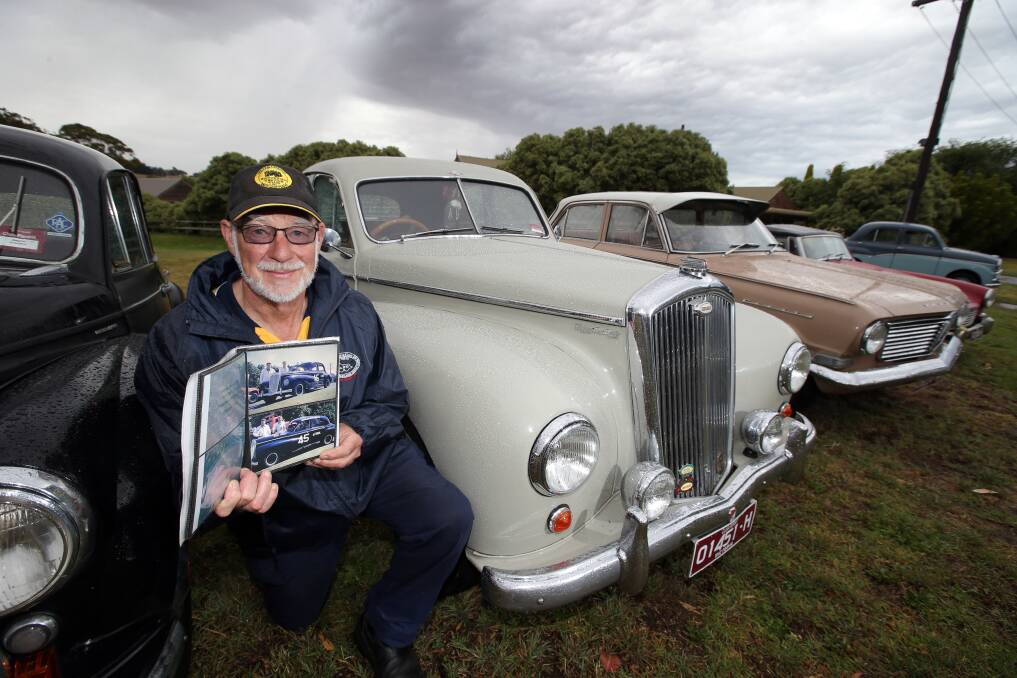Warrnambool’s Graham Conn with his restored Wolseley and photographs of the one he once raced at Premier Speedway. 150108DW02 Picture: DAMIAN WHITE