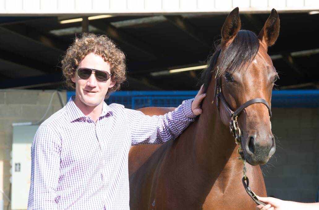 Ciaron Maher with the yearling filly he bought at a sale for $420,000. Picture: Sharon Chapman, Fast Track Photography