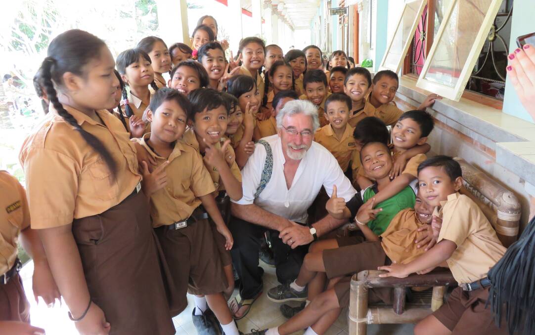 Warrnambool teacher Peter Henderson has been collecting pencils that have been dropped in school halls, cleaned them up and distributed them to schools overseas such as this one in Mangus, Bali. Picture: SUPPLIED