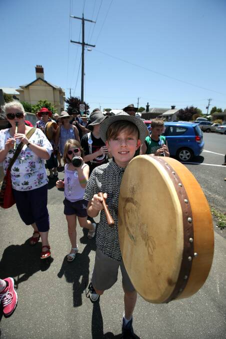 Quinlan Hames, 10, of Queenscliff, drums his way along the Lake School parade this week.  150106DW30 Picture: DAMIAN WHITE