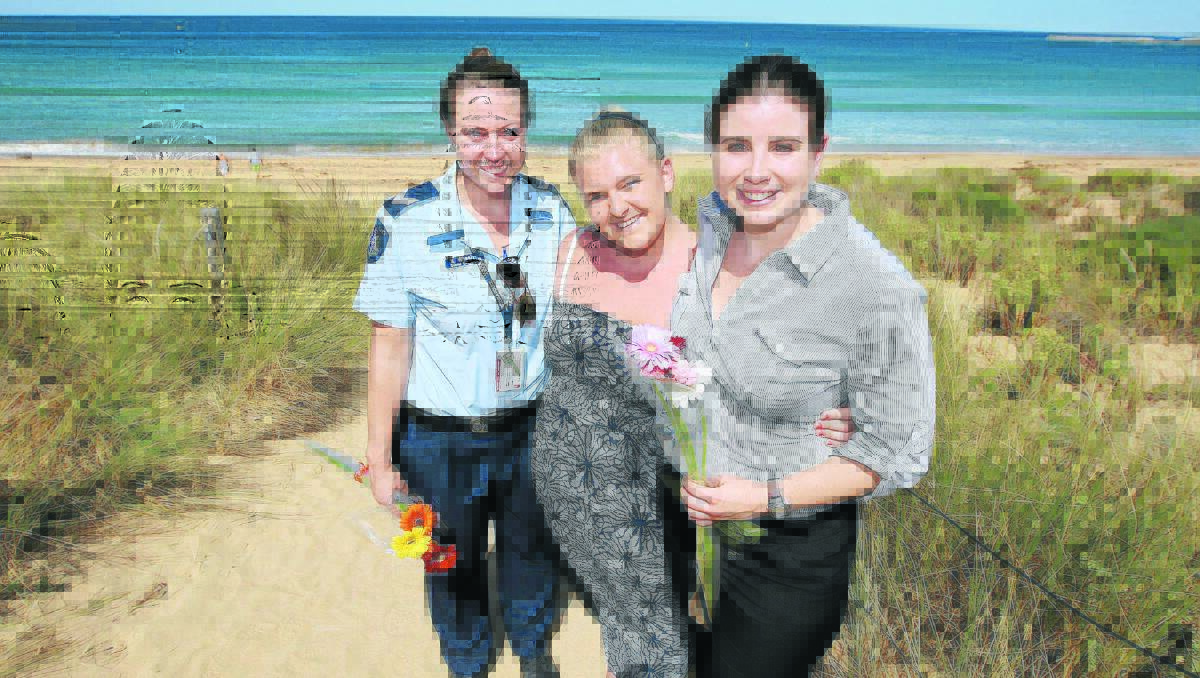 Bree Meade (centre) with two of her rescuers Senior Constable Kim Wheeler (left) and Senior Constable Lisa McRae.     130313AS03 Picture: AARON SAWALL