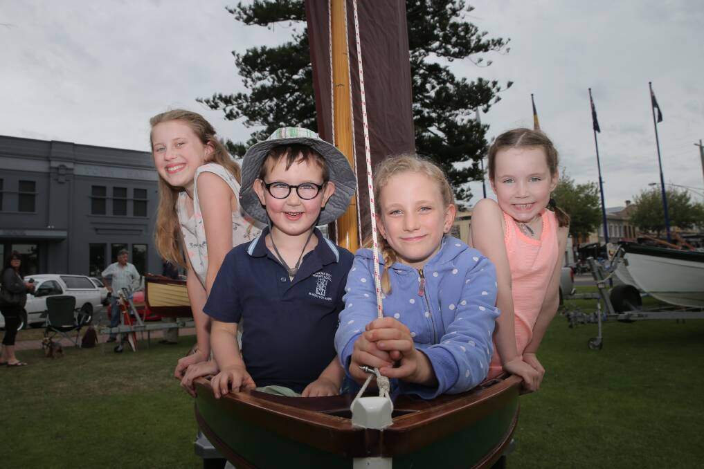 It was smooth sailing for Buchanan cousins Lucia, 12, of Geelong, Archie, 4, of Warrnambool, India, 9, of Geelong, and Felix, 7, of Warrnambool, at the inaugural boat expo at the Civic Green on Saturday. Organisers say at least 500 people came to check out the vessels on display. 141108AS27 Picture: AARON SAWALL