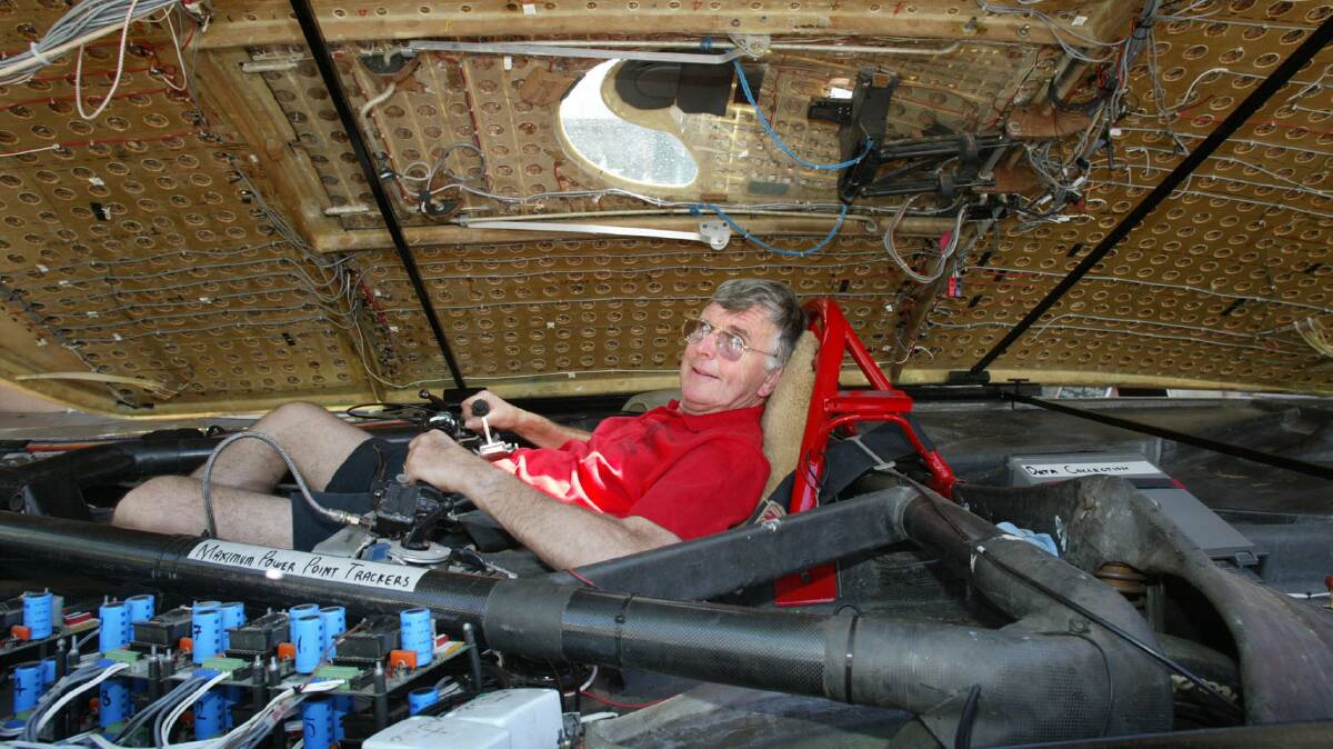 Western Victoria's Southern Aurora solar car team member and race driver Bob Cadden holding the steering levers. 