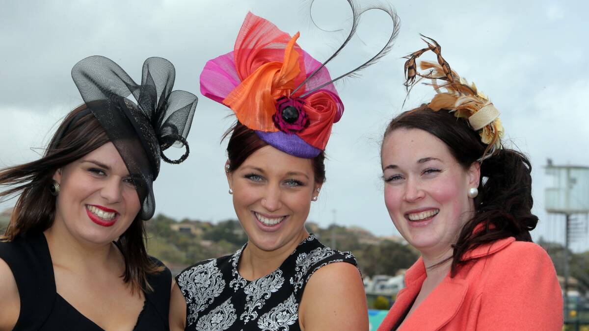 Fashion conscious Rebecca Vickers (left), Kate Duynhoven and Shaunagh Grapentin, of Warrnambool, add lively headwear to their outfits. 