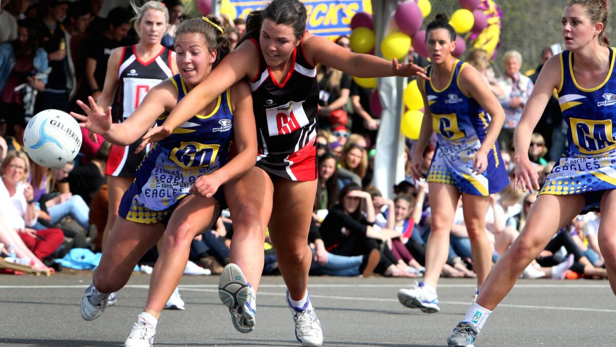 North Warrnambool Eagles' Jordyn Billings (left) and Koroit's Rachael Dobson tangled in North's A grade netball grand final win. Picture: LEANNE PICKETT 