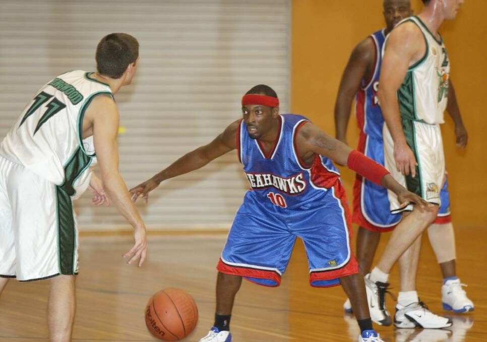 Seahawks import Curtis Small defends a Ringwood guard.