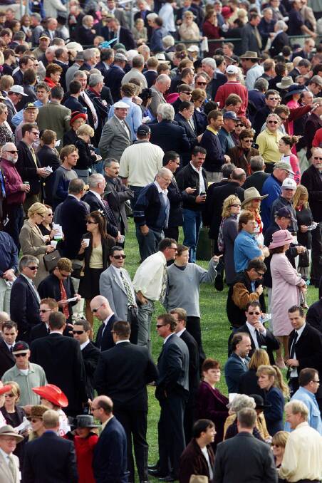 Thursday's May racing carnival crowd waiting for the start of race 3 in 2001.