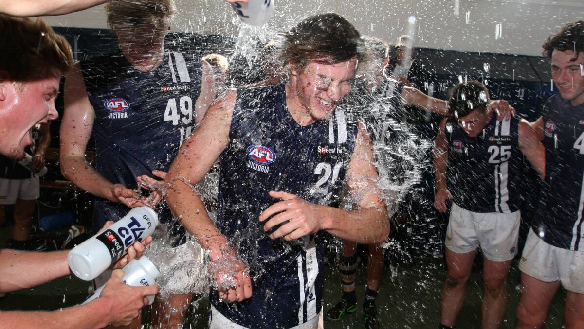 Warrnambool teenager Will Couch was in the thick of the action in April and had plenty to celebrate when his TAC Cup side Geelong Falcons beat North Ballarat Rebels by 62 points. Picture: AARON SAWALL