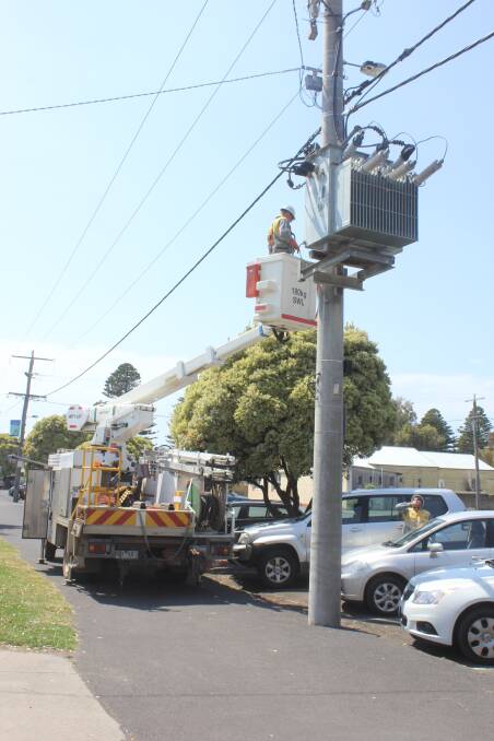 Powercor workers in Port Fairy during a January outage this year.