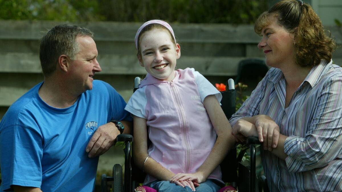 Stephanie Sayer ,10, who travels to the Royal Childrens Hospital for Scoliosis treatment, pictured with parents Kan and Adele Sayer from Port Fairy.