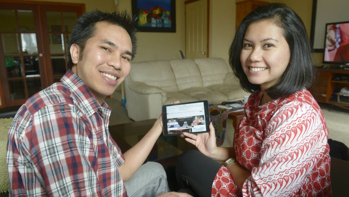 Koroit couple Alex and Sylvia Hubbarat follow the Indonesian election count online.
