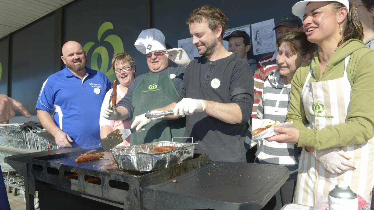 Cooking up a storm yesterday were, left to right, grocery manager Matt Bellman, online manager Libby Balmer, trolley assistant Shayne Morgan, produce manager Mat Quarrell, customer service manager Merrill Starks and bakery assistant Denise Douglas. Picture: STEVE HYNES