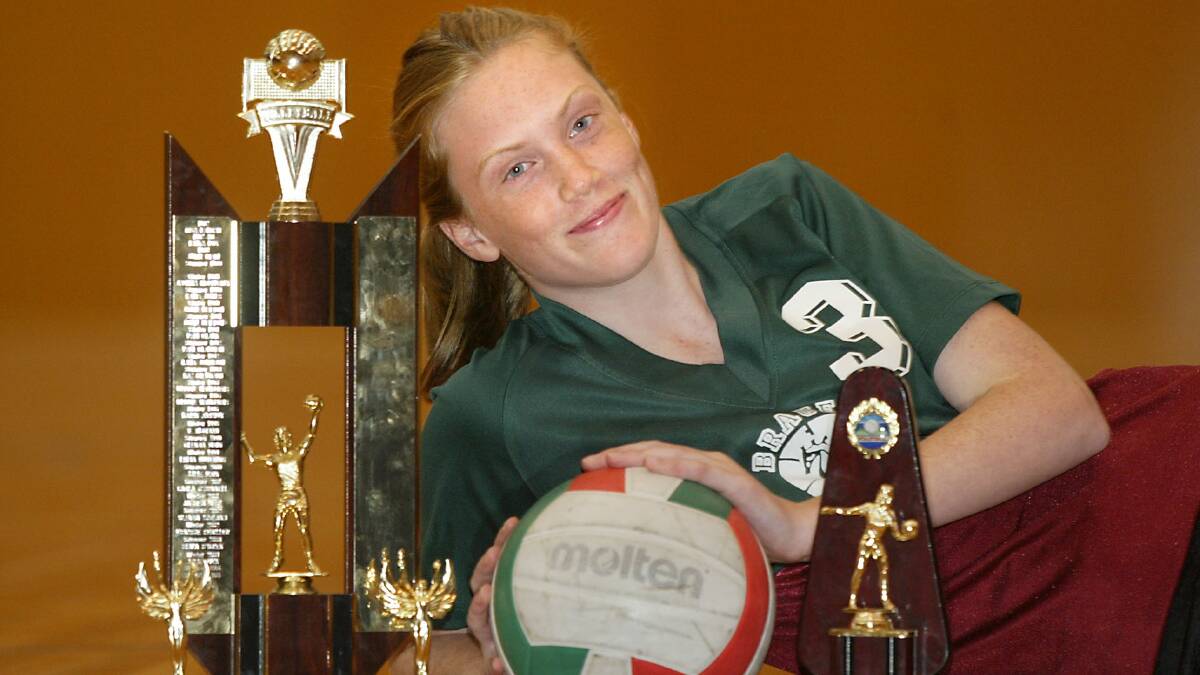 Sara Amos, 14, pictured with her Women's A grade Volleyball trophies.
