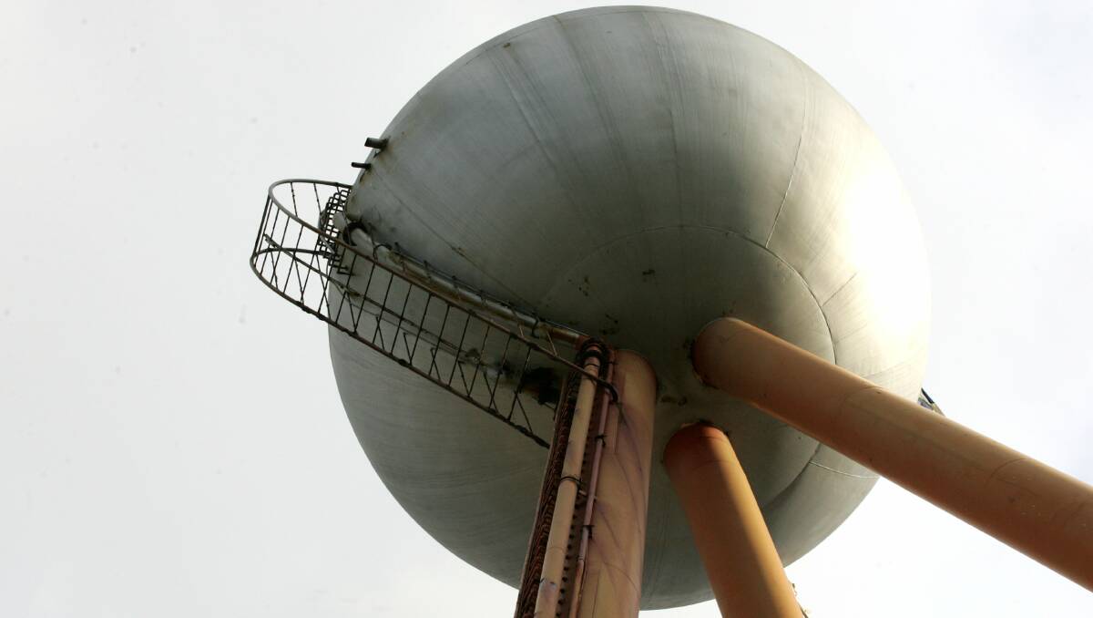 Trespassers climb a rusty ladder to get to the top of the the silver ball in 2006.
