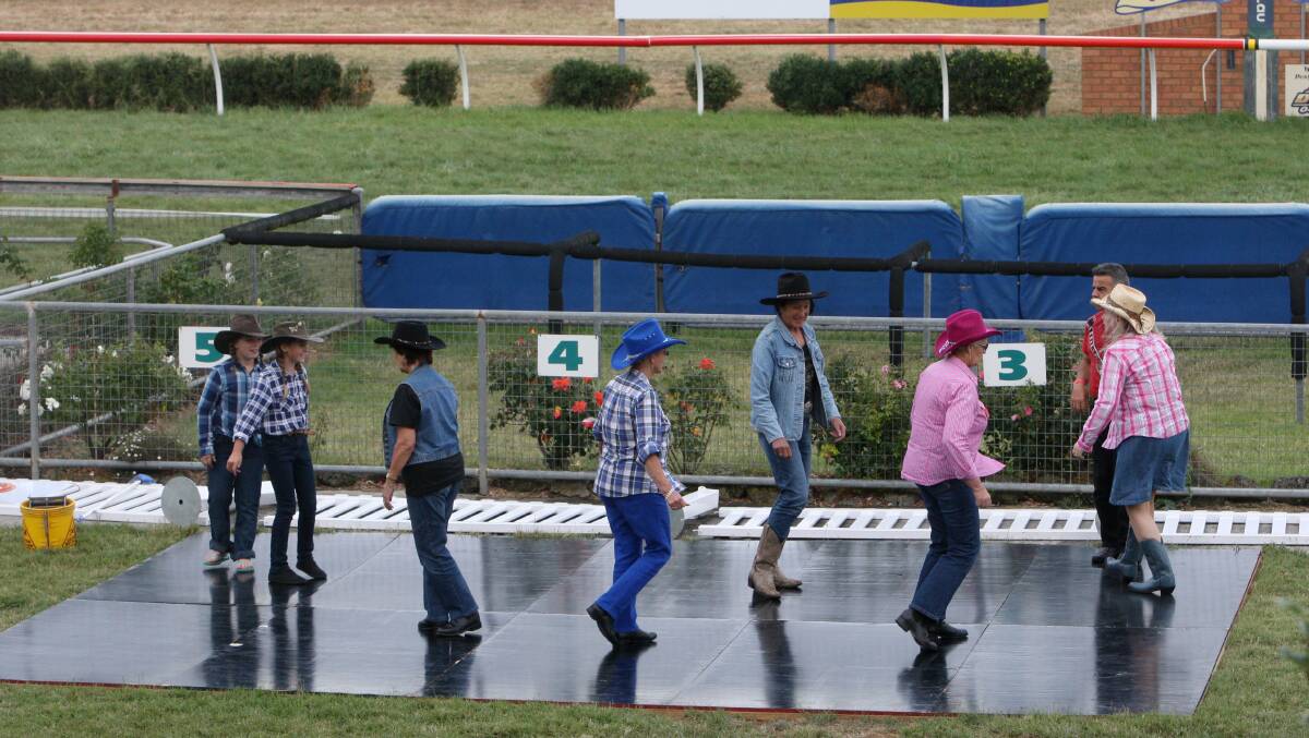 The crowd gets dancing at the Terang Country Music Festival. Picture: AARON SAWALL