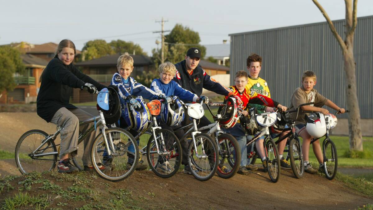 BMX riders at the track behind the YMCA.