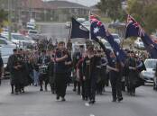 The Dennington Anzac Day service started with a march from the Shamrock Hotel to the cenotaph. Picture: ANGELA MILNE