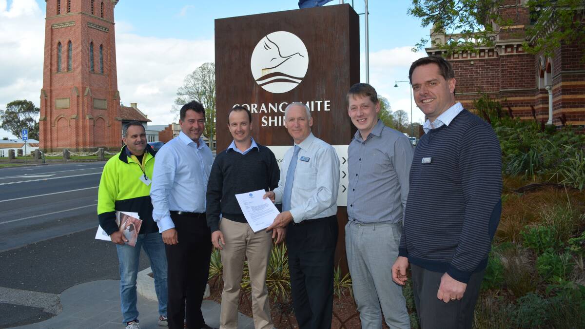 Presentation of planning permit to Camperdown Dairy: (left to right) Camperdown Dairy International corporate systems manager David Mullins, Camperdown Dairy CEO Phil McFarlane, project manager Adam Green, Corangamite planning and building services manager Greg Hayes, planning officer Andrew Lancashire and Corangamite CEO Andrew Mason.
