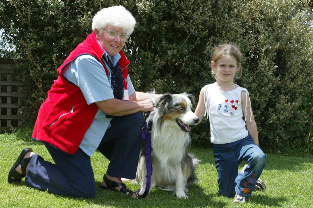 Maureen Daymond and Blaze give words of wisdom to Tiffany Kelly, 5, on responsible pet ownership.