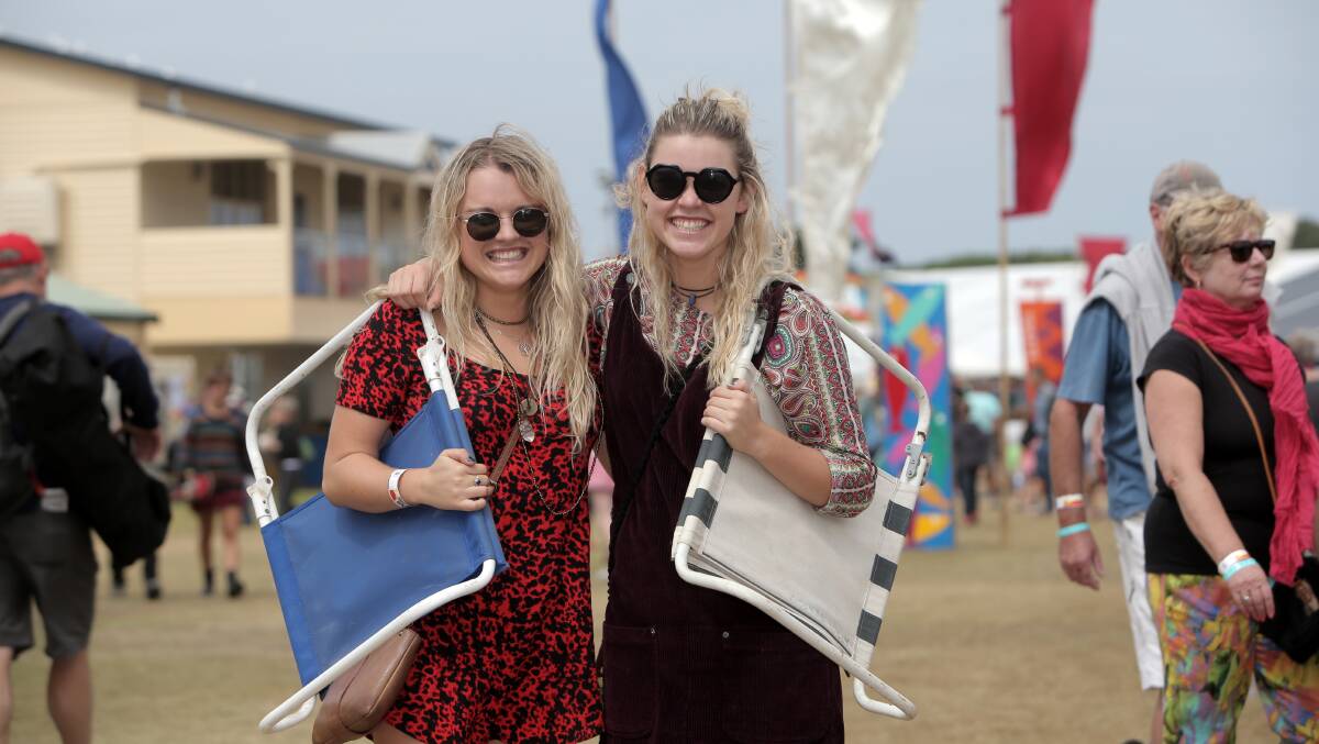Sisters Alice and Maghan Buchanan from Port Fairy enjoying Saturday's atmosphere at the Port Fairy Folk Festival.
