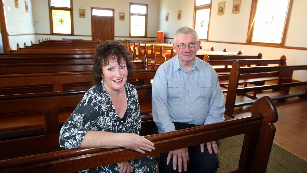 Dennington St Johns Primary School principal Kathy Dalton and Fr Michael Linehan in 2011 at the church and school site for sale.