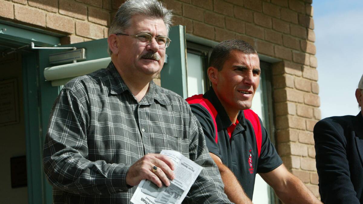 WorkSafe Victorian Country League official Glenn Scott talking with Jason Mifsud of Koroit Football Club.
