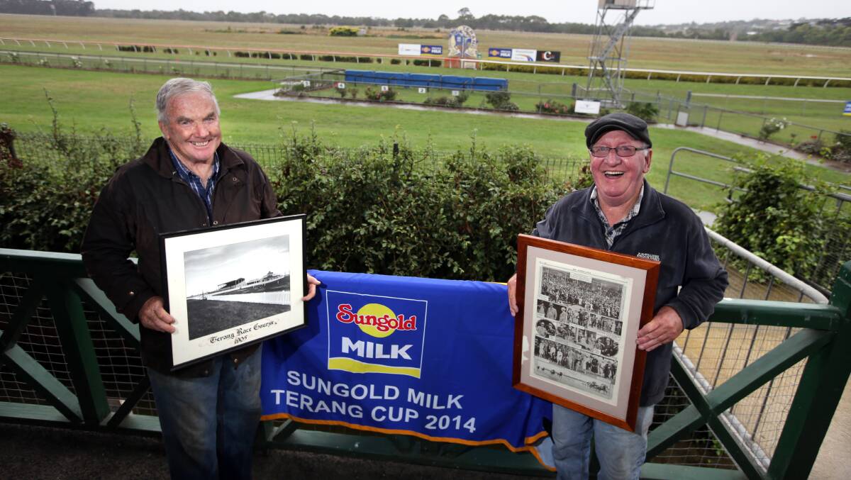 Terang Racing Club president Des McKinnon holds a photograph of the track in 1905 and committee member Tom Heffernan holds a Terang Cup meeting poster from 1927. Picture: DAMIAN WHITE
