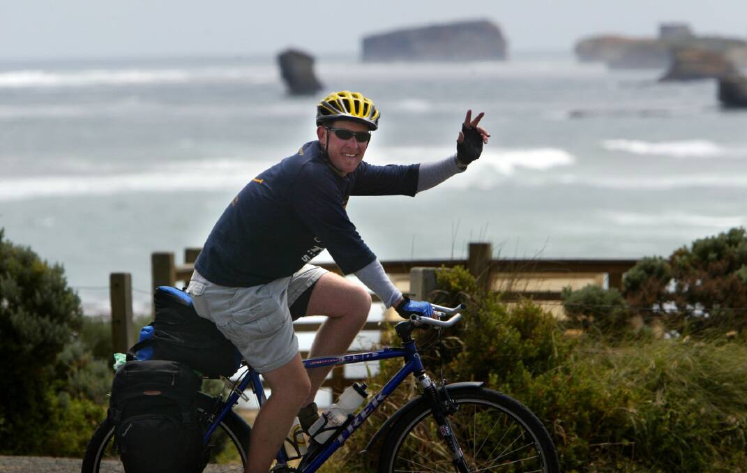 On his bike - Adelaide's Stuart Easom passes through the south-west raising money for cancer research.