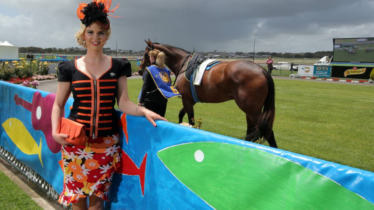 Fashions on the Field entrant winner Leah Habel from Port Fairy, with a hat made by Julie Gurry.
