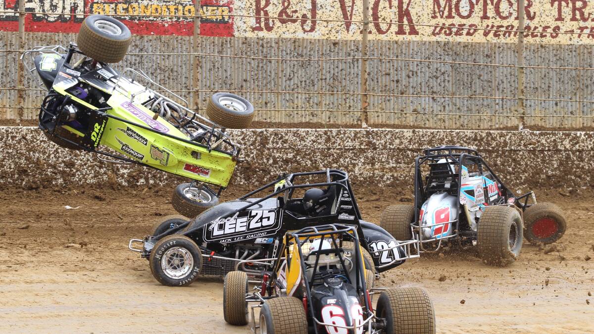 Western Australia-based New Zealander Daniel Hartigan gets some major air after flipping over a three-car crash at the wingless sprints Victorian title at Premier Speedway.