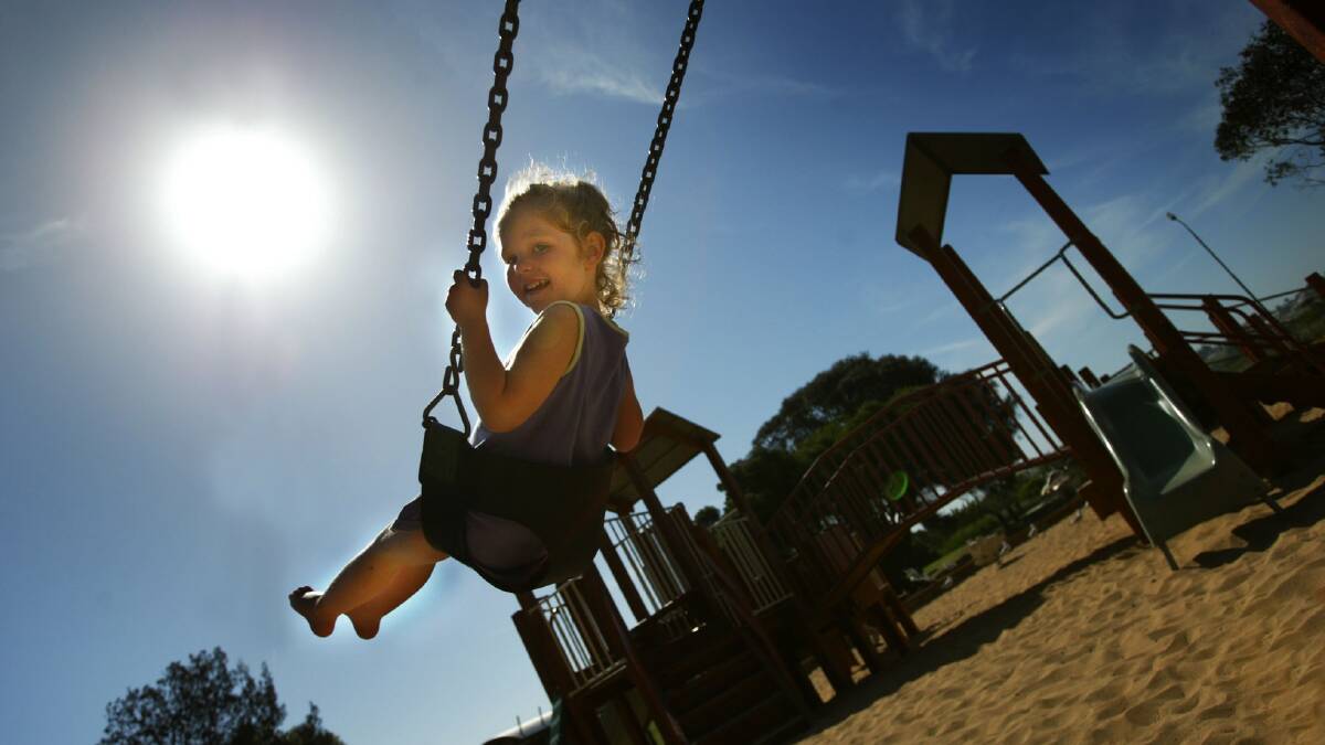 Four-year-old Emily King, of Warrnambool, enjoys another of the city's warm days at Lake Pertobe.