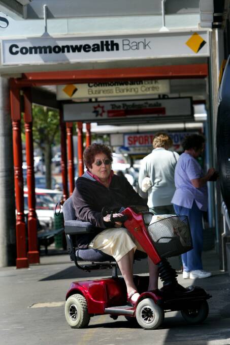 Dorothy Allen, of Warrnambool, unhappy with the new Commonwealth Bank entrance after her motorised scooter became stuck in the entrance.