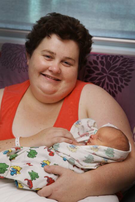 Proud mum Sarah Meade holds new daughter Zoe Elizabeth Meade who was born on March 27.