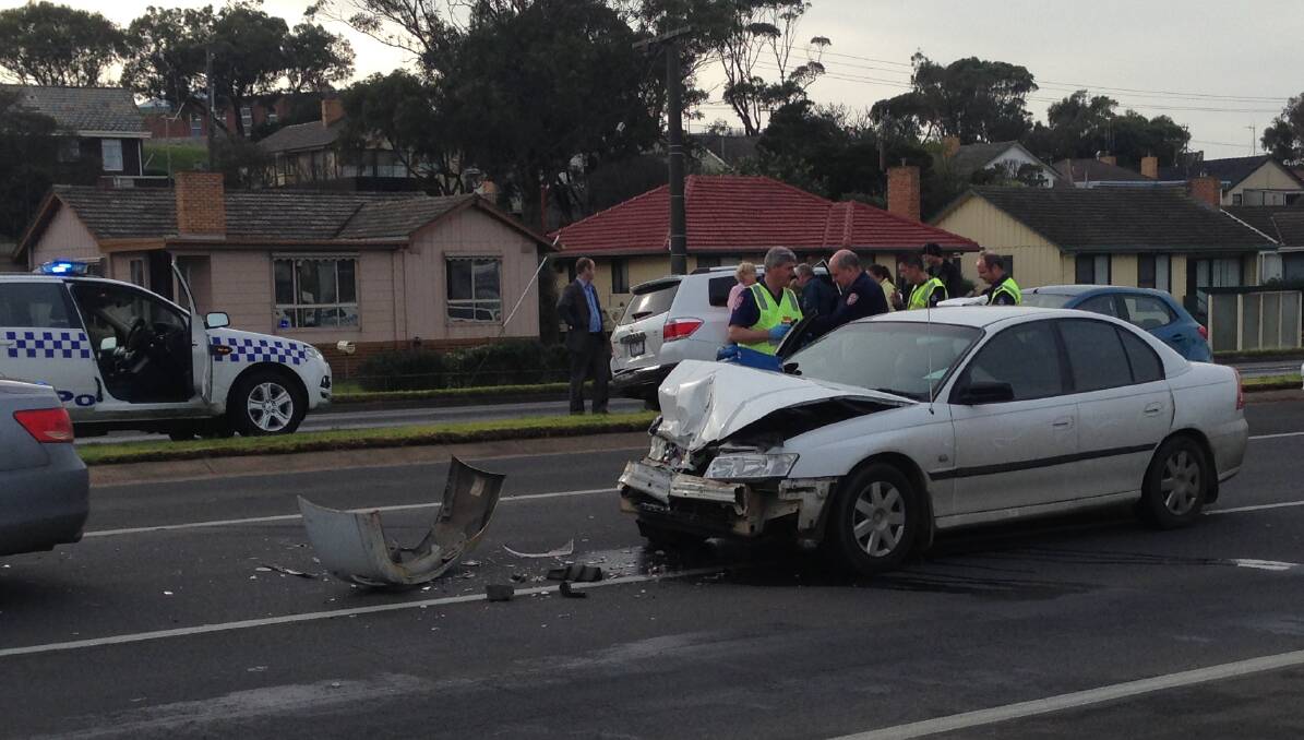 A white Holden Commodore was badly damaged in a Raglan Parade collision on Monday morning.